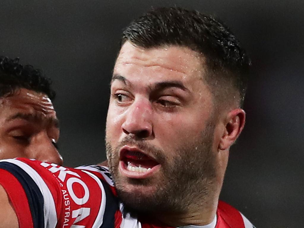 SYDNEY, AUSTRALIA - AUGUST 24: James Tedesco of the Roosters offloads the ball in a tackle during the round 23 NRL match between the St George Illawarra Dragons and the Sydney Roosters at Jubilee Stadium on August 24, 2019 in Sydney, Australia. (Photo by Matt King/Getty Images)