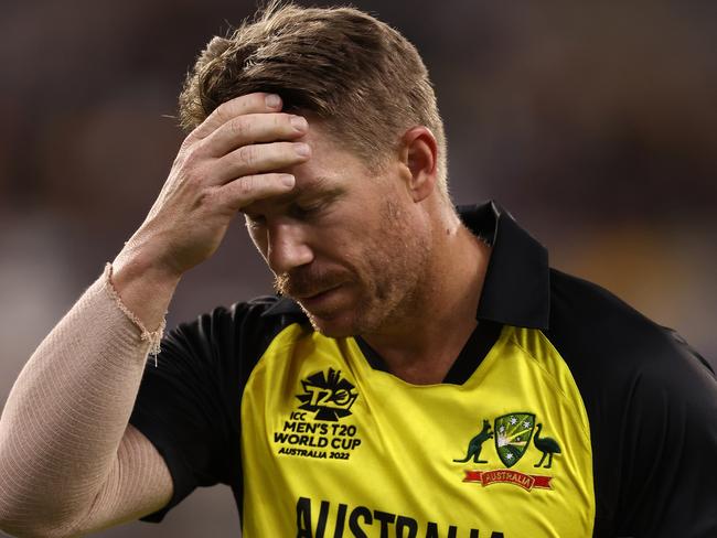 PERTH, AUSTRALIA - OCTOBER 25: David Warner of Australia walks from the field after being dismissed during the ICC Men's T20 World Cup match between Australia and Sri Lanka at Perth Stadium on October 25, 2022 in Perth, Australia. (Photo by Paul Kane/Getty Images)