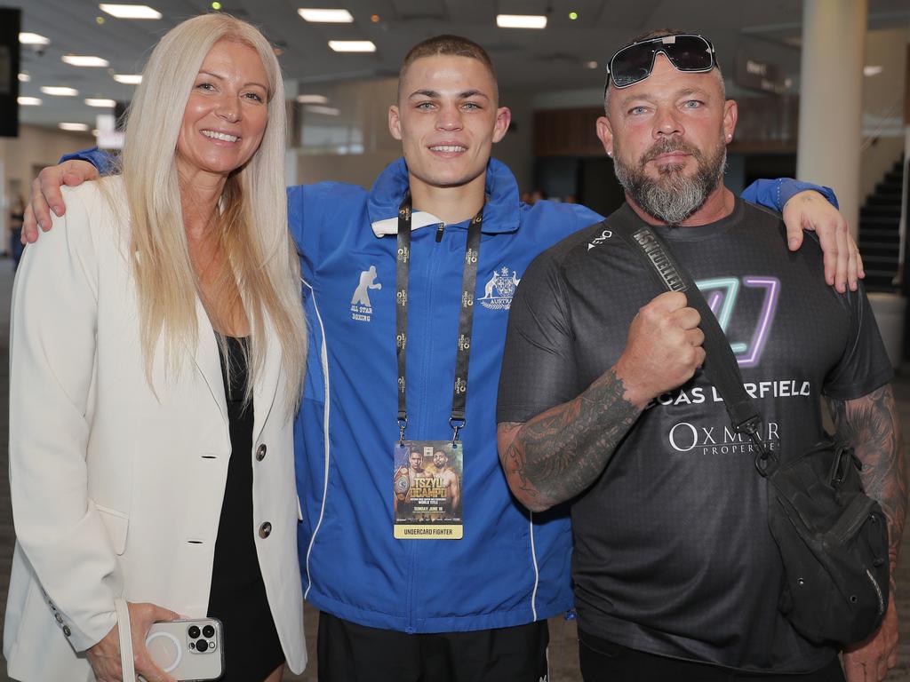 Angeliea Nevin, boxer Vegas Larfield and dad Adam Larfield at the Tim Tszyu vs Carlos Ocampo Interim WBO Super Welterweight World title contest at the Convention Centre in Broadbeach. Photo: Regi Varghese