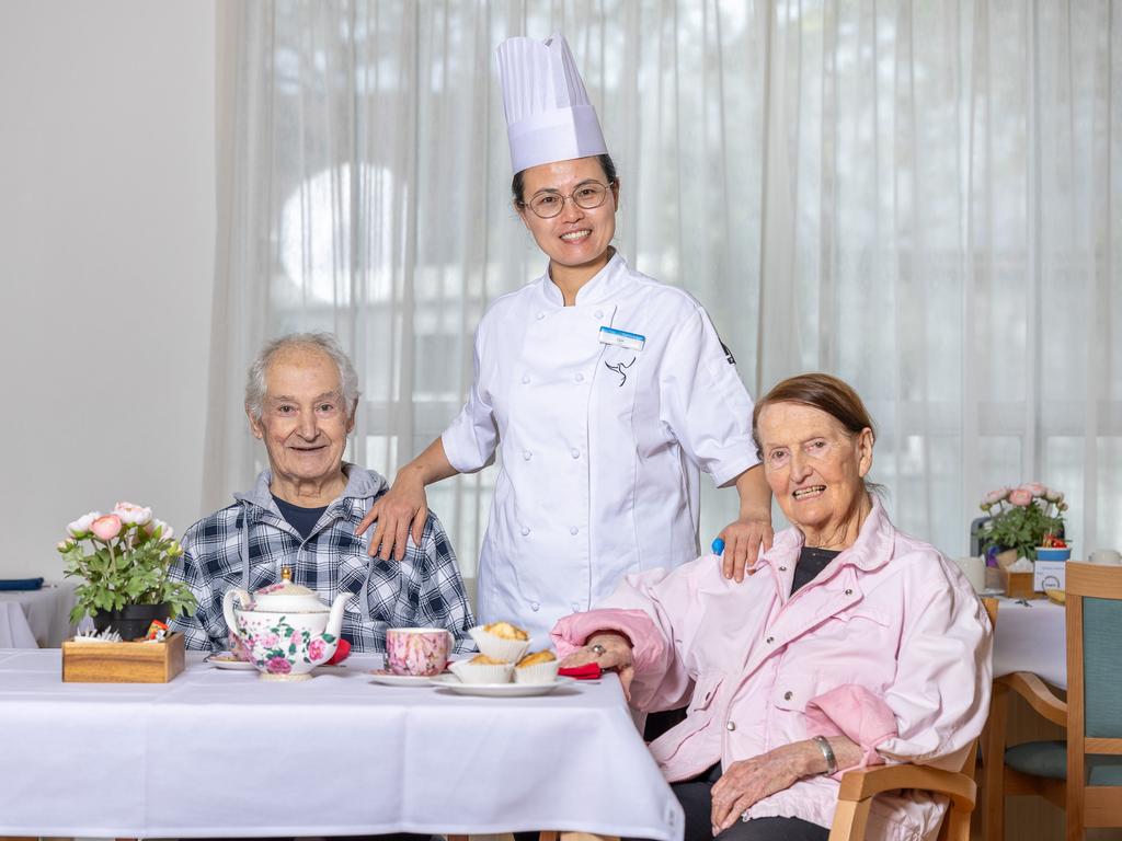 Aged Care Quality and Safety Commission Chef Yan Xu and residents of St Bedes aged care home Gloria Mcara and Arthur Andonpoulos enjoying the food that is being prepared at the aged care home. Picture Thomas Lisson