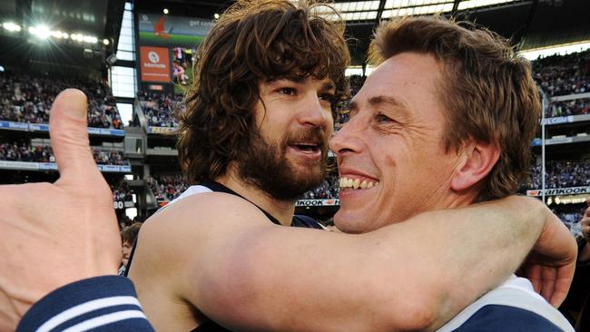 Mark ‘Bomber’ Thompson with Max Rooke after he won his first Jock McHale Medal as Geelong coach in 2009. Thompson will present the award to this year’s premiership coach. Picture: Michael Dodge