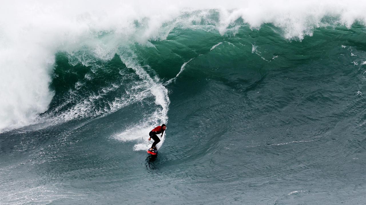 Sydney weather: Big wave surfers enjoy huge swell off the city's