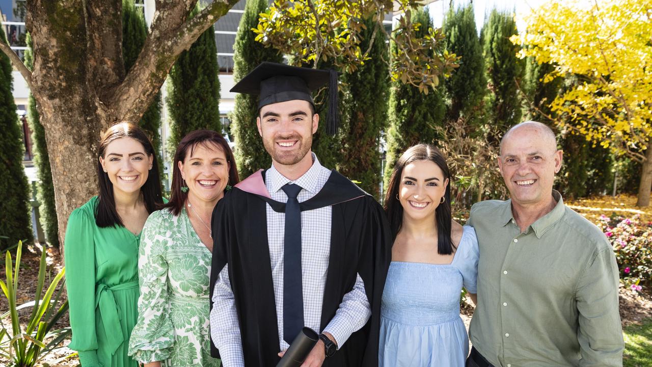 Bachelor of Education (Secondary) graduate Harrison Ham with (from left) Rianna Chandler, Janelle Ham, Caitlin Ham and Clinton Ham at the UniSQ graduation ceremony at Empire Theatres, Wednesday, June 28, 2023. Picture: Kevin Farmer