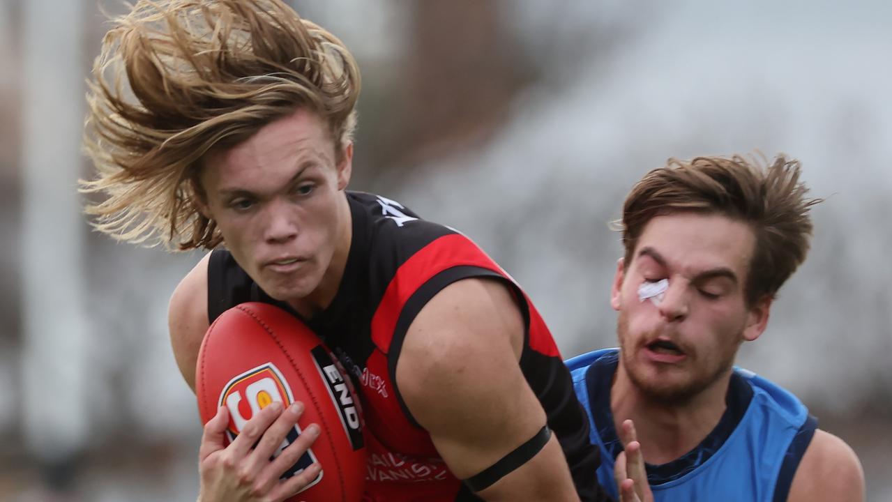 Kobe Ryan from West Adelaide marks the ball ahead of Casey Voss from Sturt. Picture: SANFL Image/David Mariuz