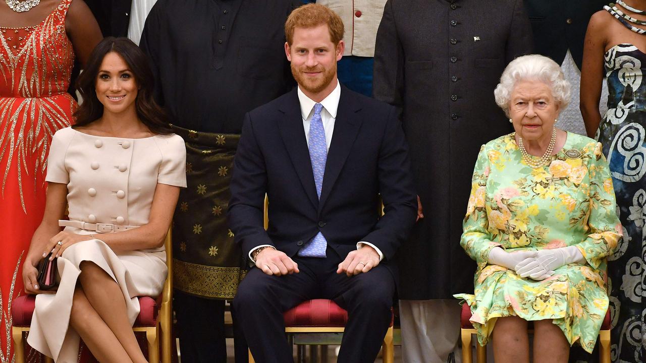 Meghan, Duchess of Sussex, Prince Harry and Queen Elizabeth II pose for a picture. Picture: John Stillwell/AFP