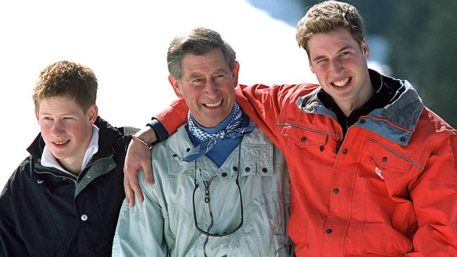 Harry, William and their dad pictured in Switzerland in 2002. Picture: Getty Images.