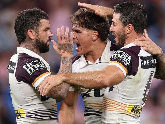 SYDNEY, AUSTRALIA - MARCH 06: AdamÃÂ Reynolds, Ben Hunt and Reece Walsh of the Broncos celebrate winning the round one NRL match between Sydney Roosters and Brisbane Broncos at Allianz Stadium on March 06, 2025, in Sydney, Australia. (Photo by Cameron Spencer/Getty Images)