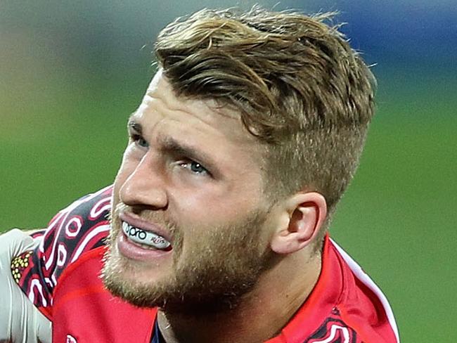 MELBOURNE, AUSTRALIA - JUNE 27: Dom Shipperley of the Reds is seen to by medical staff during the round 17 Super Rugby match between the Rebels and the Reds at AAMI Park on June 27, 2014 in Melbourne, Australia. (Photo by Robert Prezioso/Getty Images)