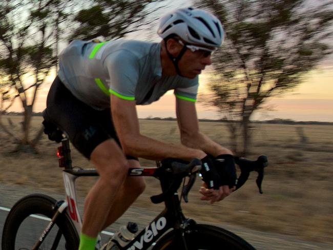 Olympic rowing champion Drew Ginn on his bike in preparation for his attempt at cycling's 24-hour record. Picture: Andrew Clifford.