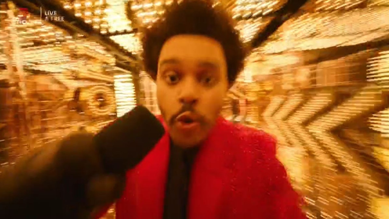 The Weeknd suddenly entered a bright gold room for one section of the show, with his face eerily distorted in the camera. Picture: Channel 7