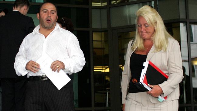 Mokbel leaving the Melbourne Magistrates’ Court with Gobbo. 