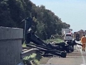 Parts of the truck spilled onto the Princes Freeway near Werribee after it crashed into a bridge. Picture: VicTraffic