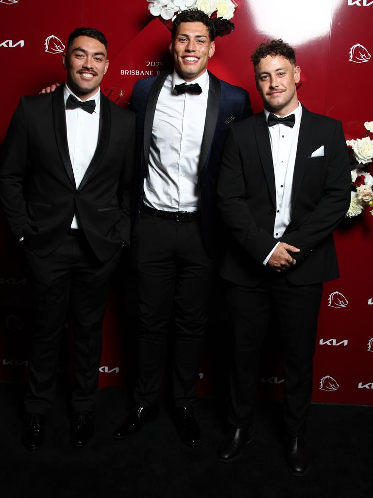 Jordan Riki (centre) and friends from New Zealand at the Broncos awards night. Picture: David Clark