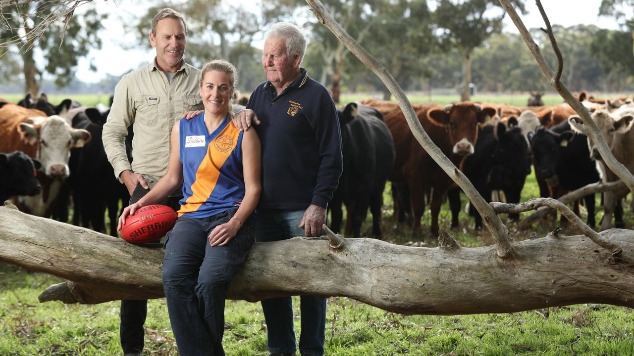 Casey McElroy with her dad Bradley and grandfather Jeffrey. Photo: Tait Schmaal