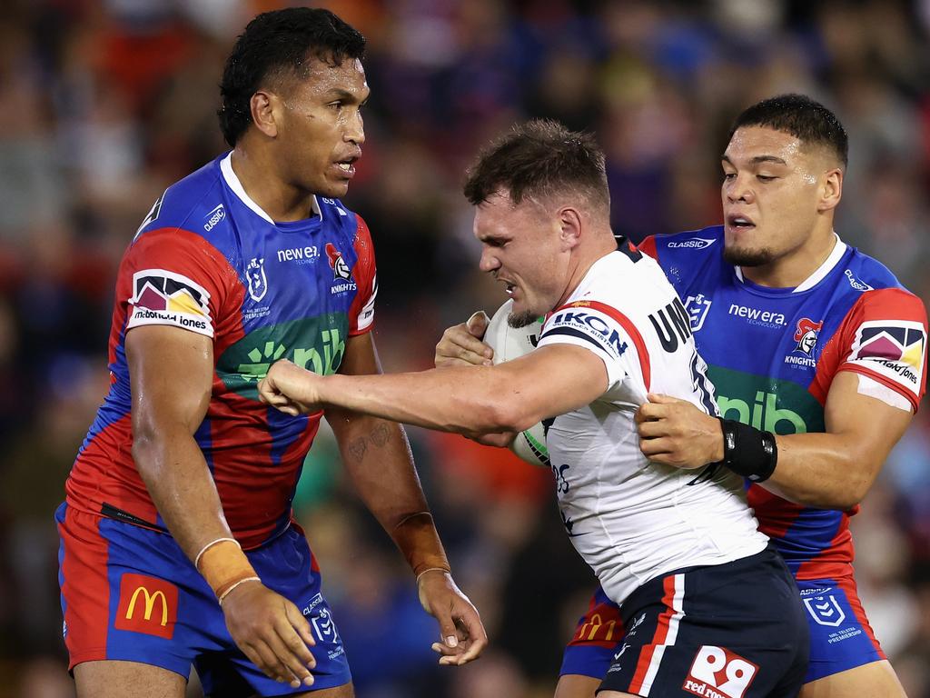 NEWCASTLE, AUSTRALIA – APRIL 11: Angus Crichton of the Roosters is tackled during the round six NRL match between Newcastle Knights and Sydney Roosters at McDonald Jones Stadium, on April 11, 2024, in Newcastle, Australia. (Photo by Cameron Spencer/Getty Images)