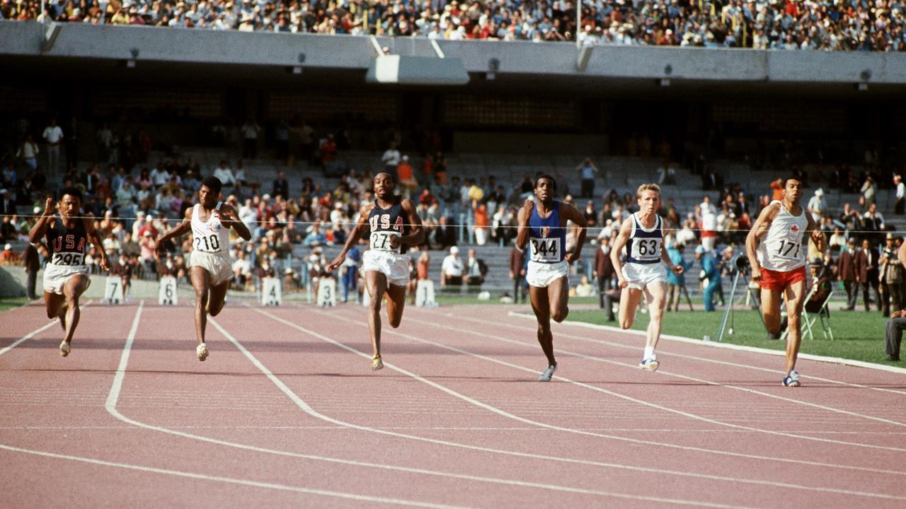 Hines on his way to gold at the 1968 Mexico City Olympics. (Photo by EPU / AFP)