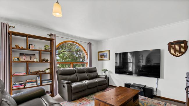 Arched windows have an outlook to the garden.