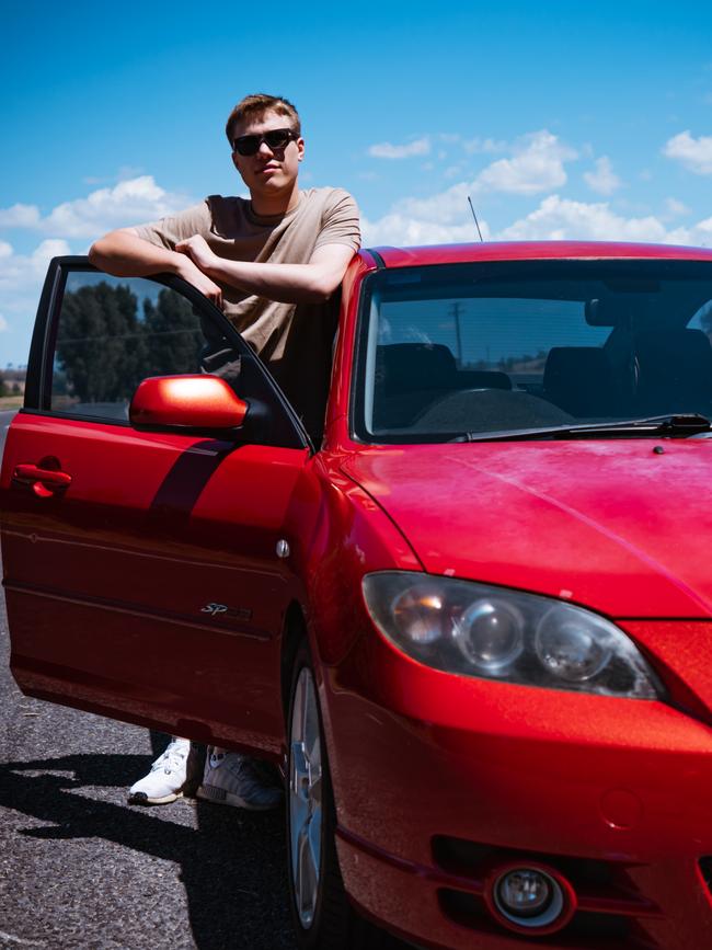 Luke Clemens pictured with his $550 car in Bathurst. Picture: Pat Greer.