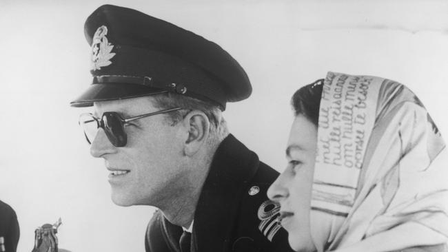 Princess Elizabeth and the Duke of Edinburgh on board the destroyer Crusader in British Columbia during their Commonwealth tour. Picture: Fox Photos/Hulton Archive/Getty Images