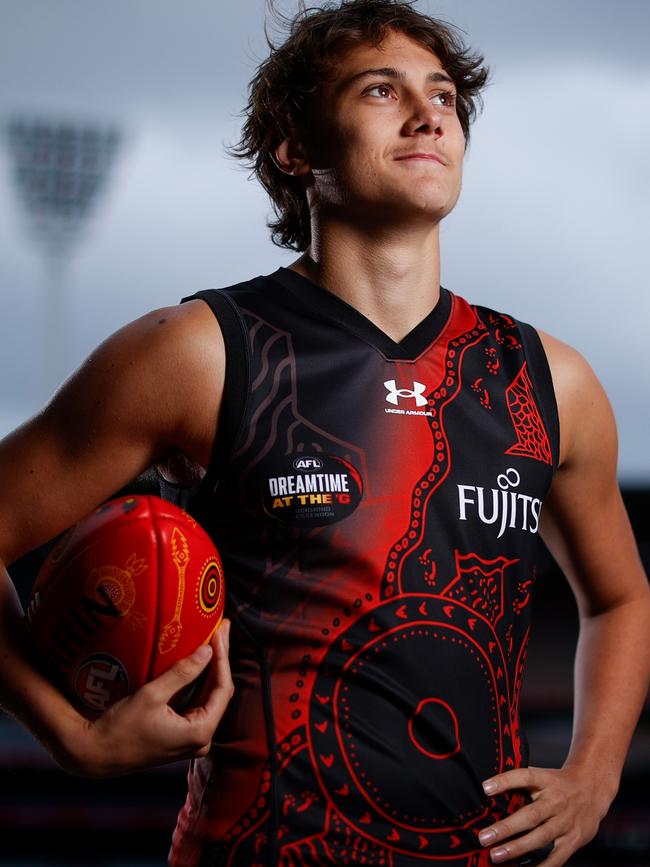 Tex Wanganeen poses in Essendon’s Indigenous guernsey for the 2022 Sir Doug Nicholls Round. Picture: Michael Willson/AFL Photos via Getty Images