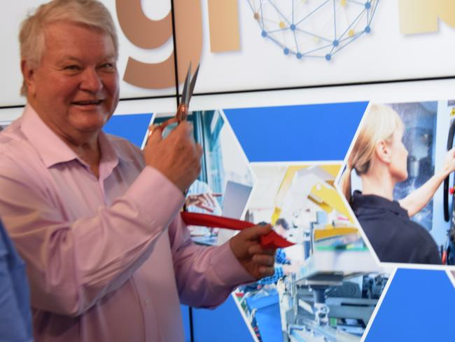 Federal Member for Flynn Ken O'Dowd cutting the ribbon at the official launch of the Gladstone Globe, November 4 2019