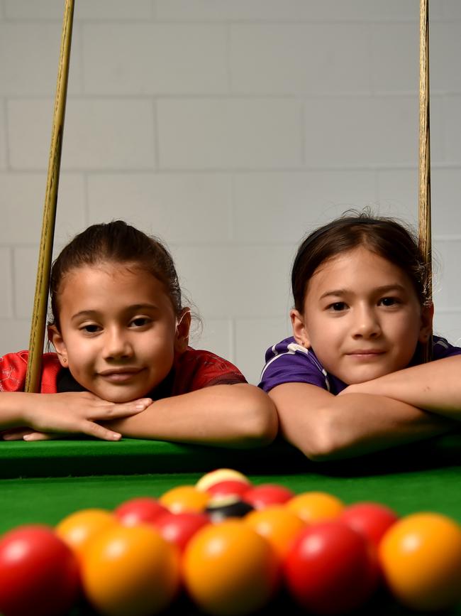 Sisters Mila, 7, and Xava Williamson, 8, are the youngest members of the Townsville 8 Ball Association. Picture: Evan Morgan