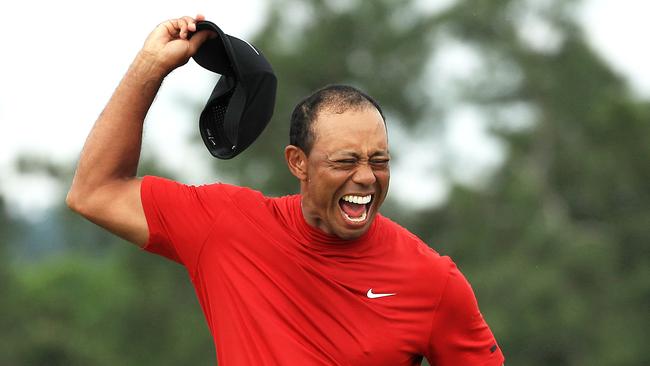 Tiger Woods celebrates on the 18th. Picture: Getty