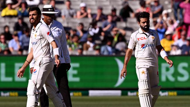 Rizwan (R) reacts after being told he was out. Picture: William WEST / AFP