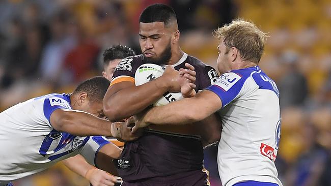 Brisbane prop Payne Haas is tackled during the round nine NRL match between the Broncos and Bulldogs at Suncorp Stadium in Brisbane. Picture: Albert Perez/Getty Images