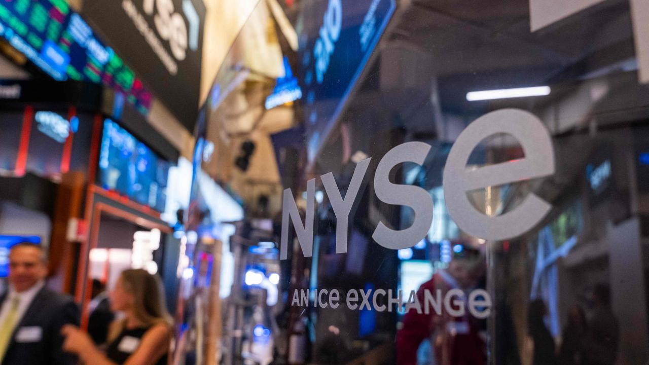 Traders and others work on the New York Stock Exchange floor. Picture: Spencer Platt/AFP