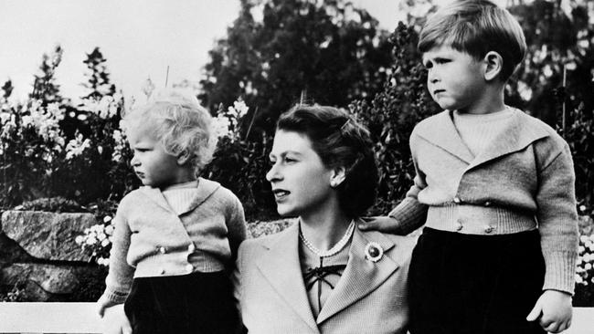 Queen Elizabeth II with Charles (R) and Anne, at Balmoral. Picture: AFP.