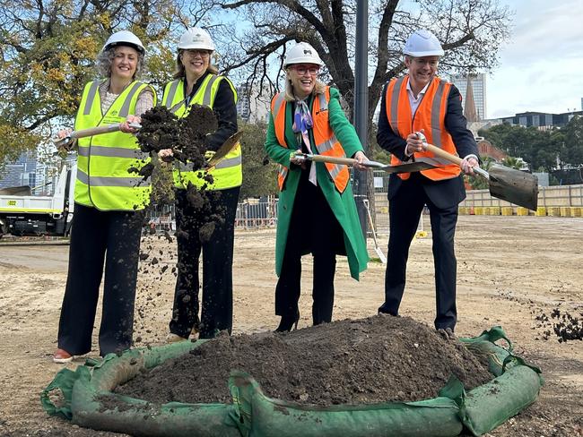 Senator Jess Walsh, federal Infrastructure Minister Catherine King, Lord Mayor Sally Capp and Deputy Lord Mayor Nick Reece turn the sod to mark the start of construction on the Birrarung Marr precinct of the Greenline project.