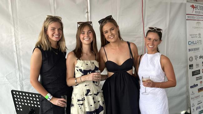 Punters dressed in their finest black and white for Derby Day races in Dubbo. Photo: Tijana Birdjan.