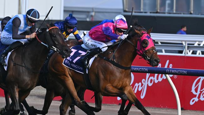 Jamie Kah takes the win on Cause of Concern on Saturday. (Photo by Vince Caligiuri/Getty Images)