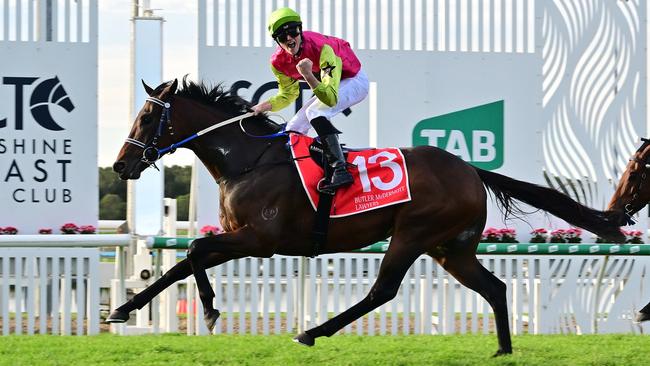 Knight's Choice wins the Group 3 Winx Guineas on the Sunshine Coast for trainers Sheila Laxon and John Symons and apprentice jockey Jaden Lloyd. Picture: Grant Peters, Trackside Photography