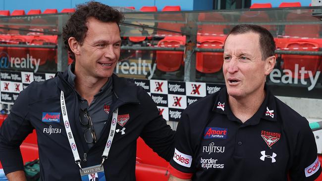 The Bombers chief executive with former Essendon coach John Worsfold.