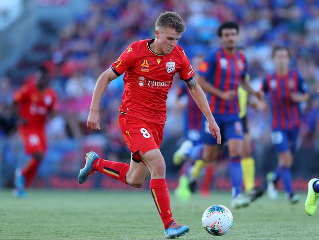 NEWCASTLE, AUSTRALIA - OCTOBER 26: Riley Mcgree of Adelaide United controls the ball during the round three A-League match between the Newcastle Jets and Adelaide United at McDonald Jones Stadium on October 26, 2019 in Newcastle, Australia. (Photo by Tony Feder/Getty Images)