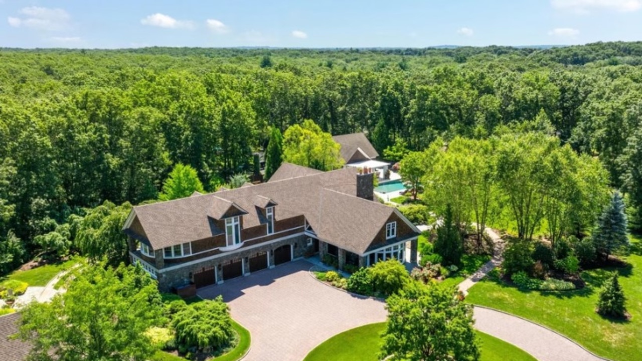 This circular driveway actually takes your around the entire front of the property. Picture: Realtor.com