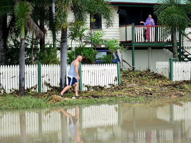 Townsville Floods 2019. Tristan Simmonds talks to neighbour Dee Crane the day after the floods at her Caromody Street home in Hermit Park. Picture: Evan Morgan