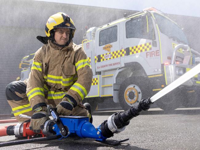 December 22, 2024: Sam Hakendorf  - Volunteers Burnside CFS with one of the trucks the CFS is rolling out for Christmas at Beth CFS Headquarters. Picture: Kelly Barnes