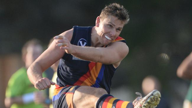 Luke Wintle thumps St Bedes Mentone Tigers forward in his 300th game.