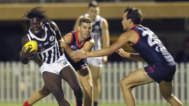 Port Adelaide’s Martin Frederick trying to get away with the ball during a match against Norwood at The Parade in April 2019. The Redlegs open their 2021 SANFL season with a clash against the Magpies at home. Picture: Dean Martin