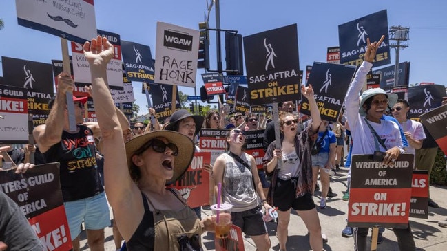 Members of the Hollywood actors SAG-AFTRA union walk a picket line with screenwriters outside of Paramount Studios in 2023. Picture: Getty Images