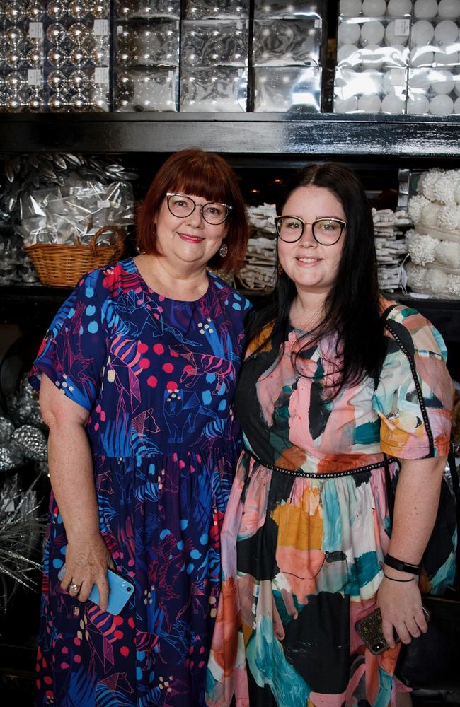 Stephanie Jones and Sophie Jones check out the Christmas wonderland. Christmas came early to The Prop House with owner Jano Kotzas throwing open the doors on the Woolloongabba-based event theming and prop hire company's yuletide wonderland showcasing all the latest in Christmas theming options at an exclusive preview event. Picture: Kim Holloway, Socials: Damien Anthony Rossi