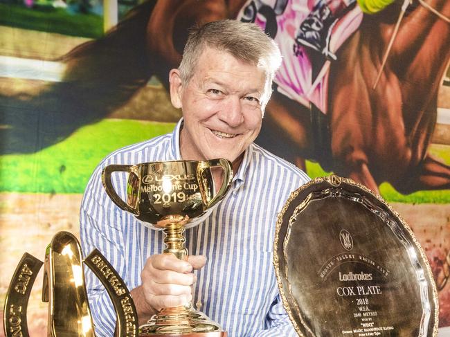 Managing owner Geoff Corrigan of Vow And Declare pictured with his winning Melbourne Cup and other cups including Magic Millions, Golden Slipper and Cox Plate.Picture: NIGEL HALLETT