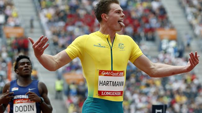 Australia's Alex Hartmann reacts as he crosses the finish line in second place in his men's 200m heat at Carrara Stadium during the 2018 Commonwealth Games on the Gold Coast, Australia, Tuesday, April 10, 2018. (AP Photo/Mark Schiefelbein)