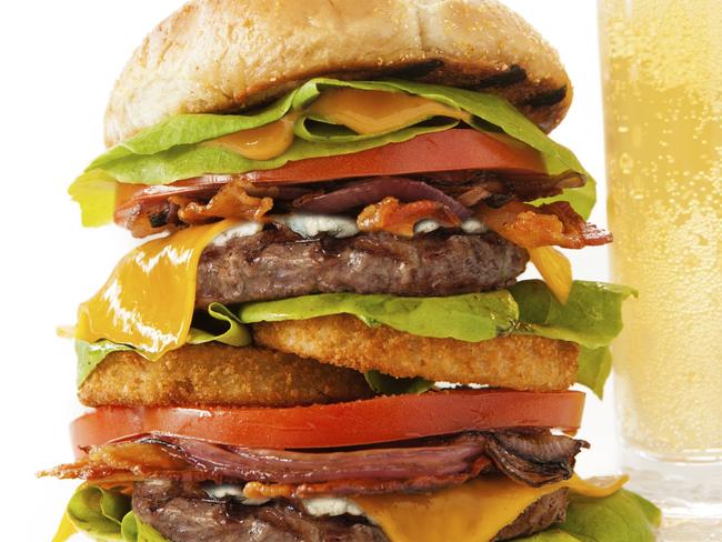 Bacon Double Cheeseburger with Tall Beer. Unhealthy food. Thinkstock