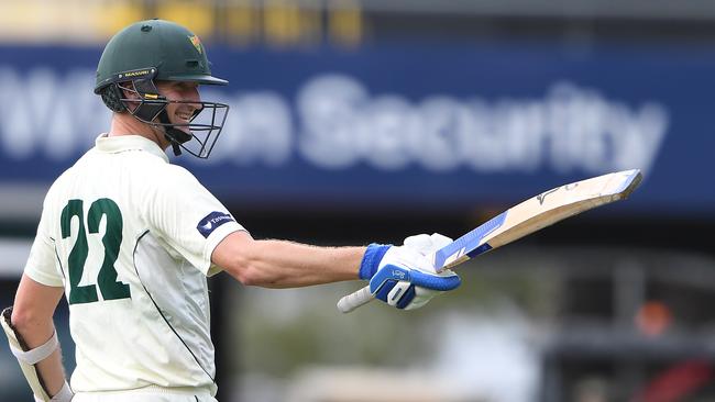 Jackson Bird of the Tigers celebrates a half century during day two of the Sheffield Shield match between Tasmania and New South Wales at Blundstone Arena. Picture: Steve Bell/Getty Images