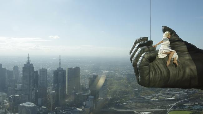 Stunt double Leigh-Ann Vizer’s life was in King Kong’s hands the day she scaled Eureka Tower to help promote the show’s Melbourne opening. Picture: Nicole Cleary