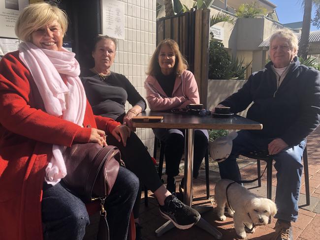 Stacey Driver (second from left), the owner of the cafe, Pronto Creative Foods, on Barrenjoey Rd, Palm Beach on Tuesday, with loyal customers Corrie Sullivan, Christine Rattray and Peter Rattray. Picture: Jim O’Rourke